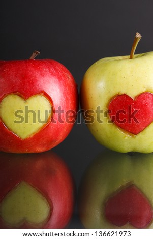 Two apples with hearts