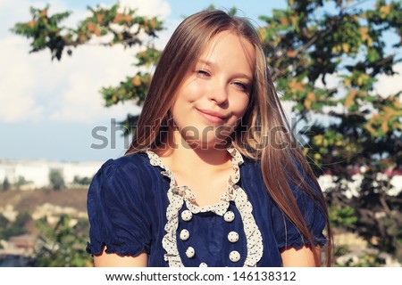 portrait of a beautiful young fat girl outdoors