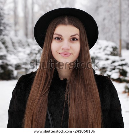 Hipster Fashion Winter. Stylish Funny Girl Outdoors