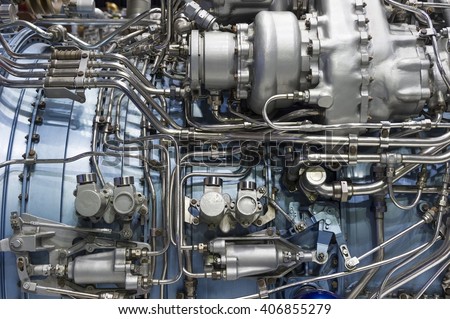 Jet engine, internal structure with hydraulic, fuel pipes and other hardware and equipment, aviation, aircraft and aerospace industry, selective focus