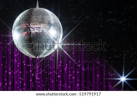 Party disco ball with stars in nightclub with striped violet and black walls lit by spotlight, nightlife entertainment industry