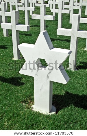Memorial Star of David (Magen David) in a green grassy field
