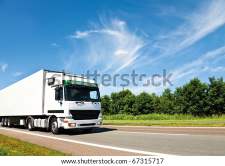 white truck on highway white truck on highway