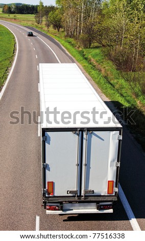 White truck on asphalt road