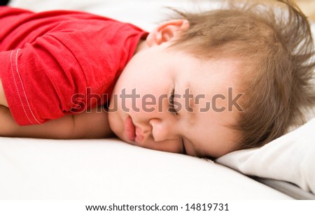 ))*(( صـوره مـنـي وصـوره مـنـك ))*(( - صفحة 9 Stock-photo-boy-in-red-dress-sleeping-on-bed-napping-14819731