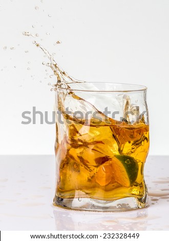 Orange drink with lime splash