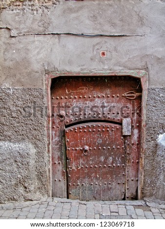Old, mysterious moroccan door in Marrakesh