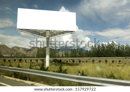 Highway billboard blue sky