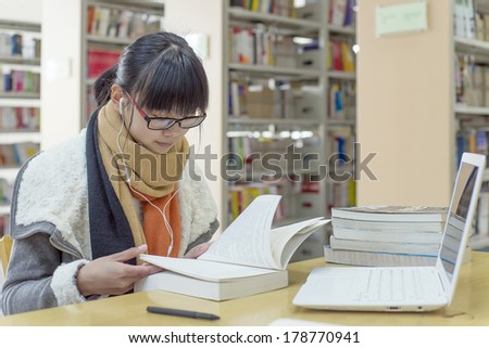 Library computer use Chinese girl