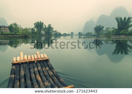 China Guilin Yangshuo bamboo rafting in the beautiful \