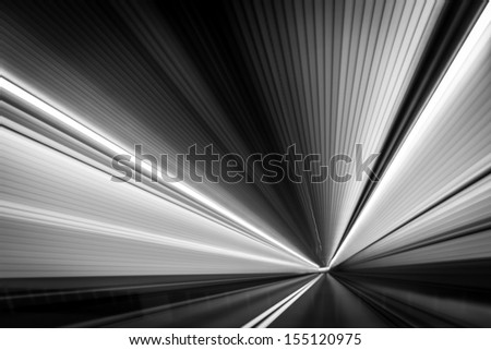 Abstract  time-warp  photo taken from a moving car inside a tunnel.