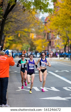 NEW YORK - NOVEMBER 3: Jelena Prokopcuka, Christelle Daunay and Valeria Straneo run the 2013 NYC Marathon on November 3, 2013 in New York. Jelena finished 3rd, Christelle 4th and Valeria 5th.