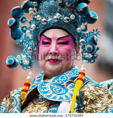 New York - February 2, 2014: Proud Chinese Man Wearing Makeup Parades At The Lunar New Year Festival In Chinatown.