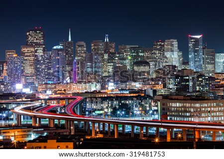 San Francisco skyline with rush hour traffic on the winding highways