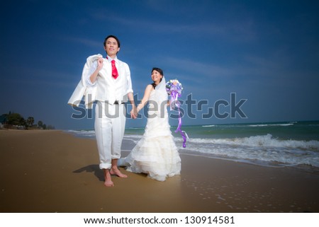In love bride and groom are posing in romantic emotion