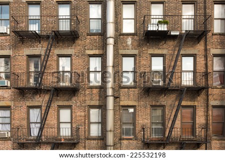 old brick building with fire escapes in front, Manhattan, New York