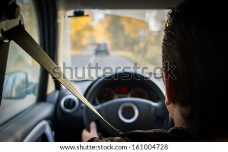 Driver behind the wheel