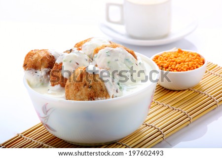 South Indian dish  Curd vadai  with  side dish.