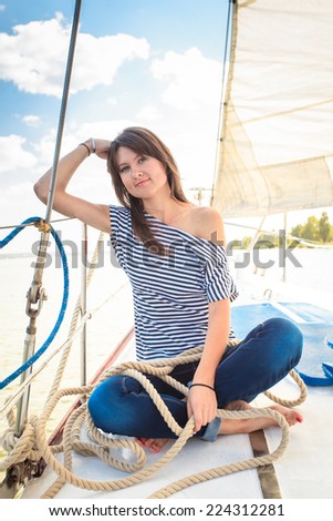 Woman, yacht rope