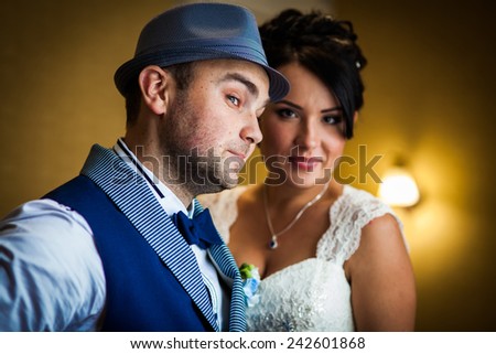 laughing bride and groom