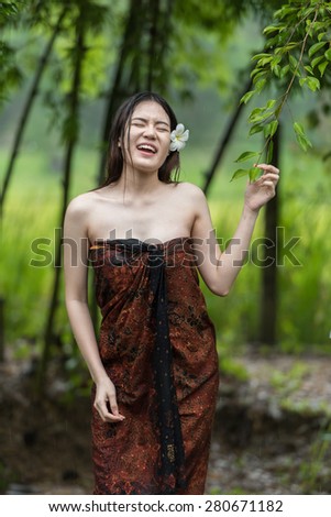 asian woman get wet
