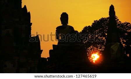 Silhouette of Buddha Statue at Wat Chaiwattanaram, Ayutthaya, Thailand.