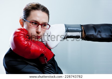 a punch in the face of a business woman