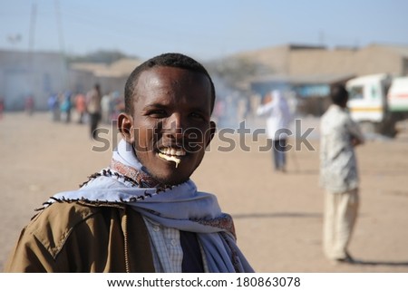 HARGEISA, SOMALIA - JANUARY 8, 2010: Somalis in the streets of the city of Hargeysa. City in Somalia,  capital of  unrecognized state of Somaliland. Much of the population lives in poverty.