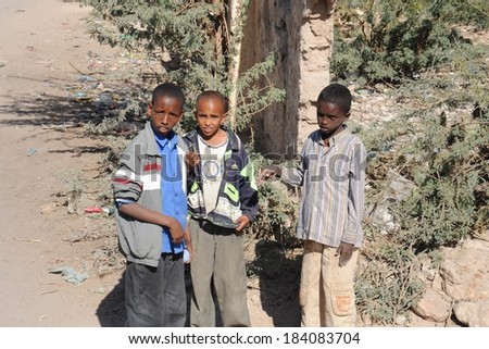 HARGEISA, SOMALIA - JANUARY 8, 2010:Unidentified Somalis in the streets of the city of Hargeysa. City in Somalia, capital of unrecognized state of Somaliland. Much of the population lives in poverty.