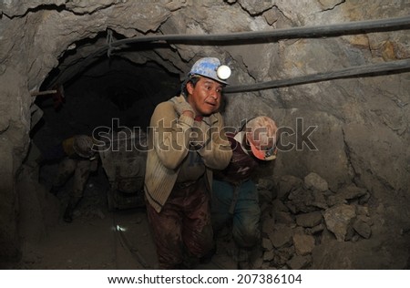 POTOSI, BOLIVIA - SEPTEMBER 7, 2010: The city Potosi  is one of the highest cities in  world. History City is closely connected with extraction of rich deposits of silver. Miners from silver mine.