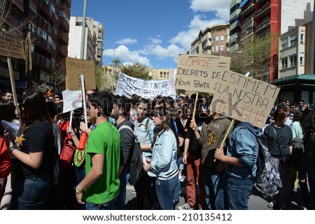 ALICANTE, SPAIN - MARCH 27, 2014: Protest demonstration of university students and college students in Alicante  Alicante - city in  Valensiysky Autonomous Region, capital of the Province of Alicante.