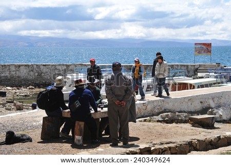 ISLAND OF THE SUN, BOLIVIA - SEPTEMBER 4, 2010:  Sun island is located on lake Titicaca. The Indians named it in honor of the Sun God Inti. Locals from the island of the Sun.