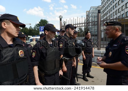 MOSCOW, RUSSIA - AUGUST 8, 2013:  Instructing police officers. Patrol and inspection service of the police provides public safety in the capital.