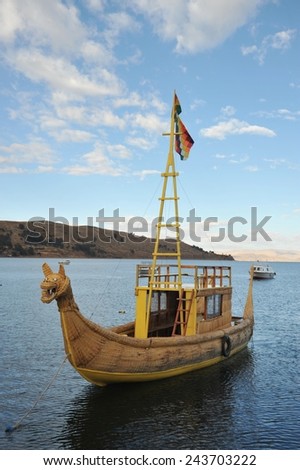 TITICACA LAKE, BOLIVIA - SEPTEMBER 4, 2010: Reed boat to us Mountain Lake Titicaca. Indians since ancient times swam on lake by reed boats. Modern Indians build boats for transportation of tourists.