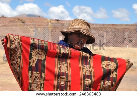 TIAHUANACO, BOLIVIA - SEPTEMBER 3, 2010: Unknown Bolivian woman from Tiahuanaco. Tiahuanaco, an important object of pre-Columbian archaeological site on the high Altiplano plateau in Western Bolivia.