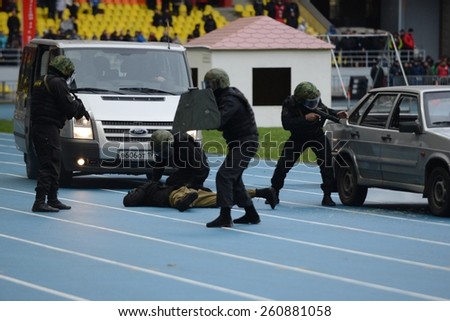 MOSCOW, RUSSIA - OCTOBER 19, 2013:Special-purpose Units of the army and police are designed for special events with the use of special tactics and tools. Indicative detention police SWAT car.