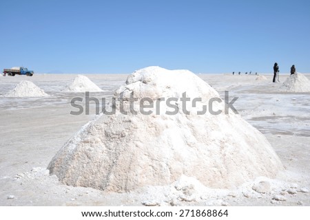 UYUNI LAKE, BOLIVIA - SEPTEMBER 9, 2010:Salt production on the Uyuni salt flats, dried up salt lake in Altiplano. The largest salt flat in the world. Every year it produces about 25 thousand tons salt