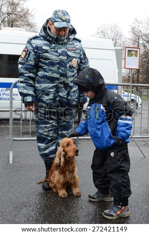 MOSCOW, RUSSIA - OCTOBER 19, 2013:Dogs remain indispensable police, helping to effectively protect public order and promoting disclosure of the most complex crimes. Cynologists with dogs in Moscow.
