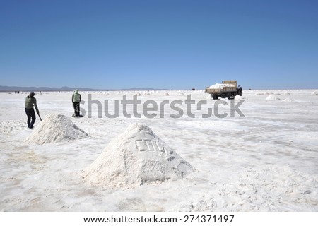 UYUNI LAKE, BOLIVIA - SEPTEMBER 9, 2010:Salt production on the Uyuni salt flats, dried up salt lake in Altiplano. The largest salt flat in the world. Every year it produces about 25 thousand tons.salt
