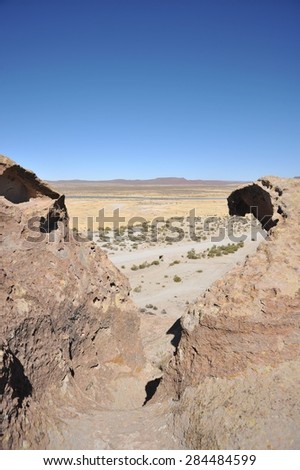 ALTIPLANO, BOLIVIA - SEPTEMBER 10, 2010: Altiplano is a vast plateau in the Andes mountains. Is the Western lower part of the interior plateau of the Central Andes. Valley Kala-Kala the city of Oruro.