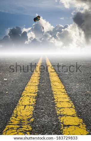 parachute on the sky with grunge road surface, road to success