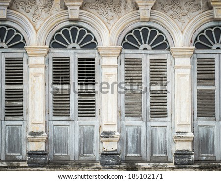 retro wooden windows and  decoration in Chino Portuguese style architecture