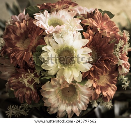 Close up vintage artificial flower bouquet background