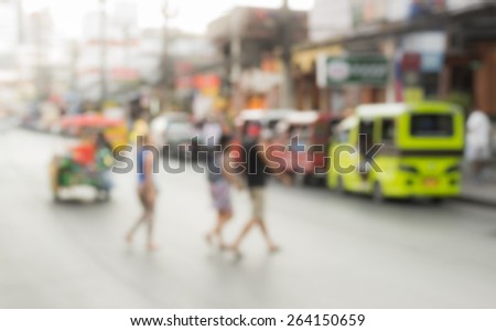 Abstract of blurred people crossing the street