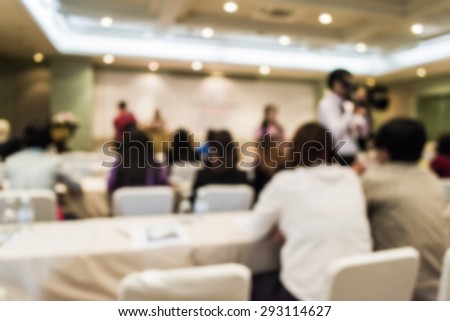 Abstract of blurred people in the meeting room