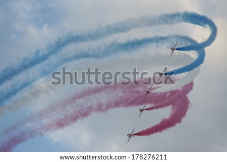 Sunderland, UK - July 27th 2013: The RAF red arrows create smoke trails at the Sunderland air show 2013.