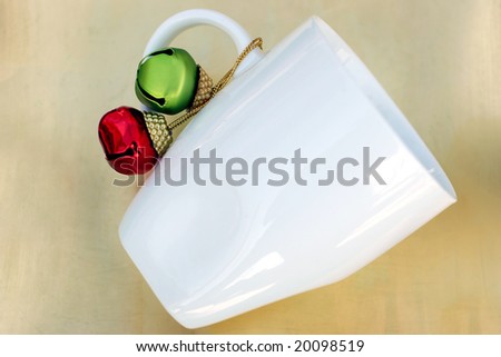 Blank white mug surrounded by holiday decoration