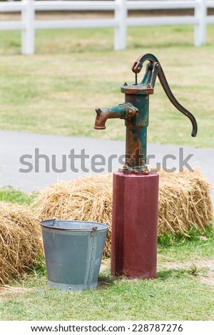 Retro style hand water pump (old water pump)