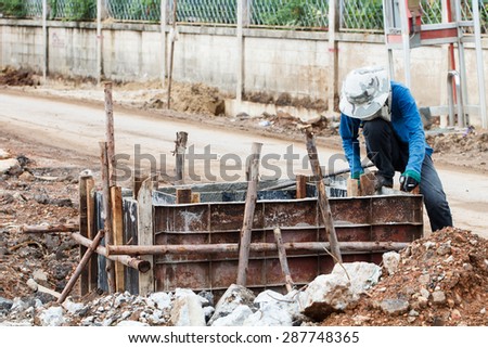 Rural construction worker on road construction