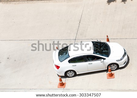 NONTHABURI , THAILAND -JUNE 28 2015: Top view of learner driver test car with instructor taking lessons. Photo at local side Nonthaburi, thailand.